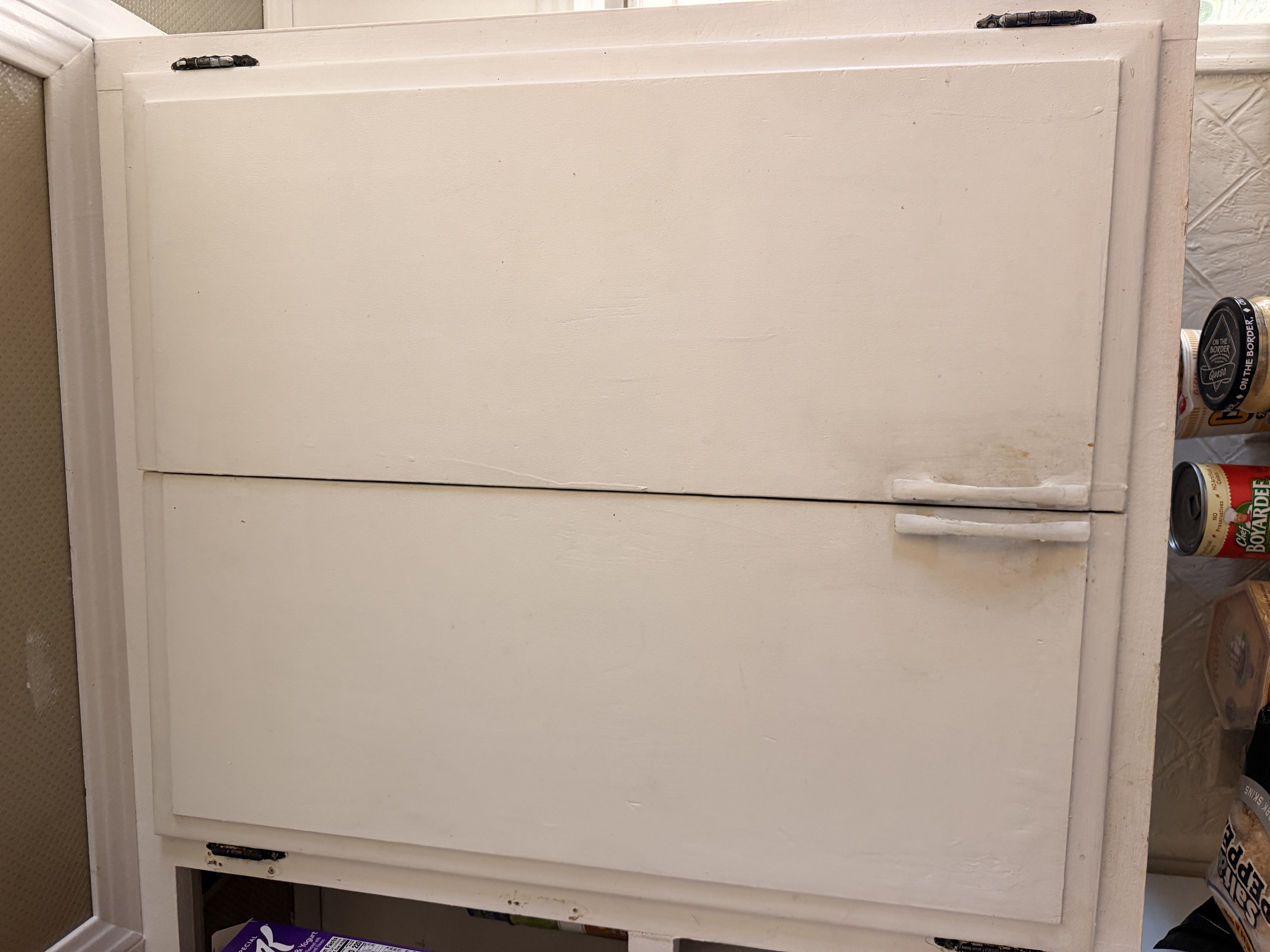 Wide cabinet doors before cleaning