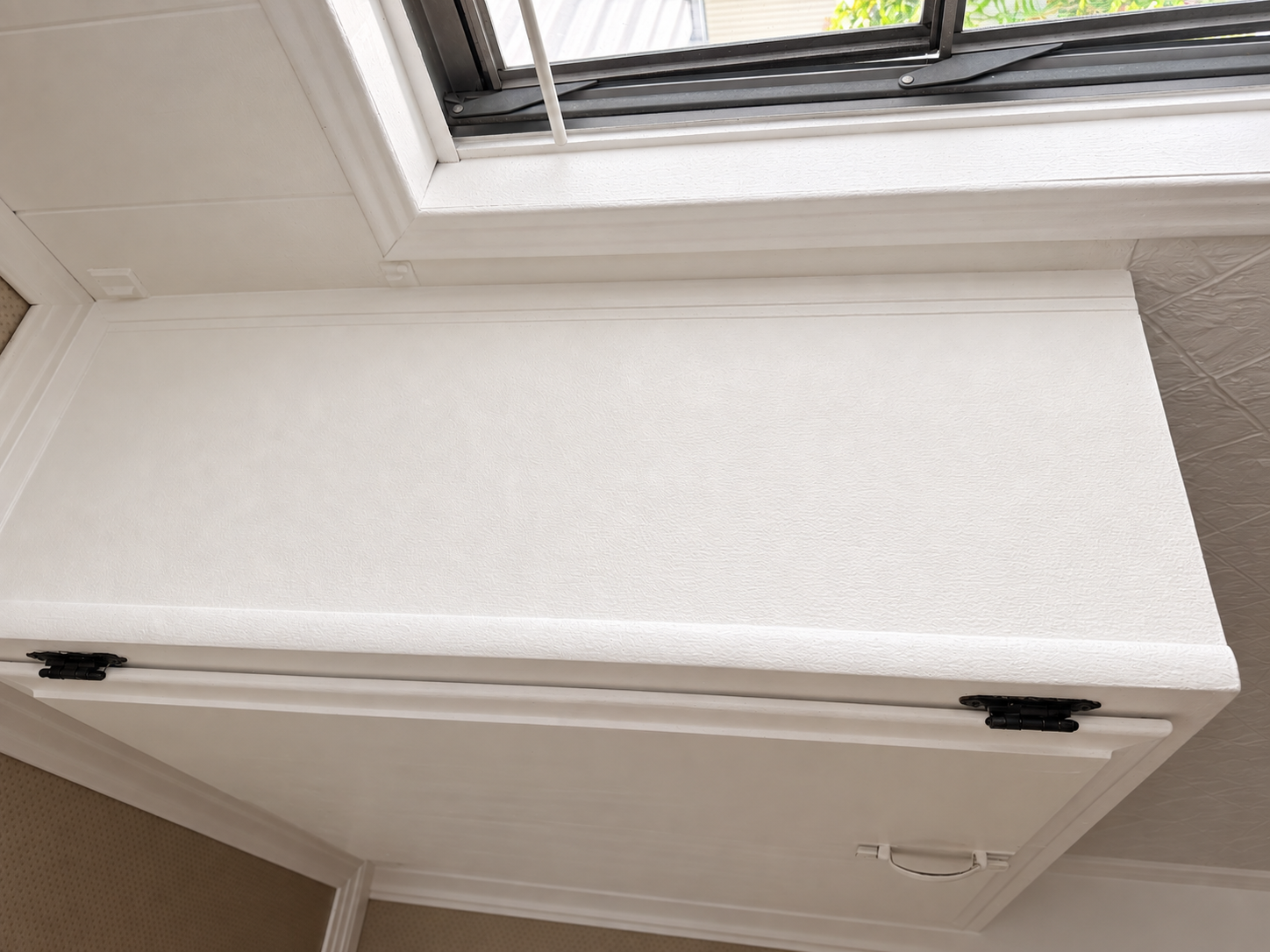Cabinet side and trim after detailed cleaning