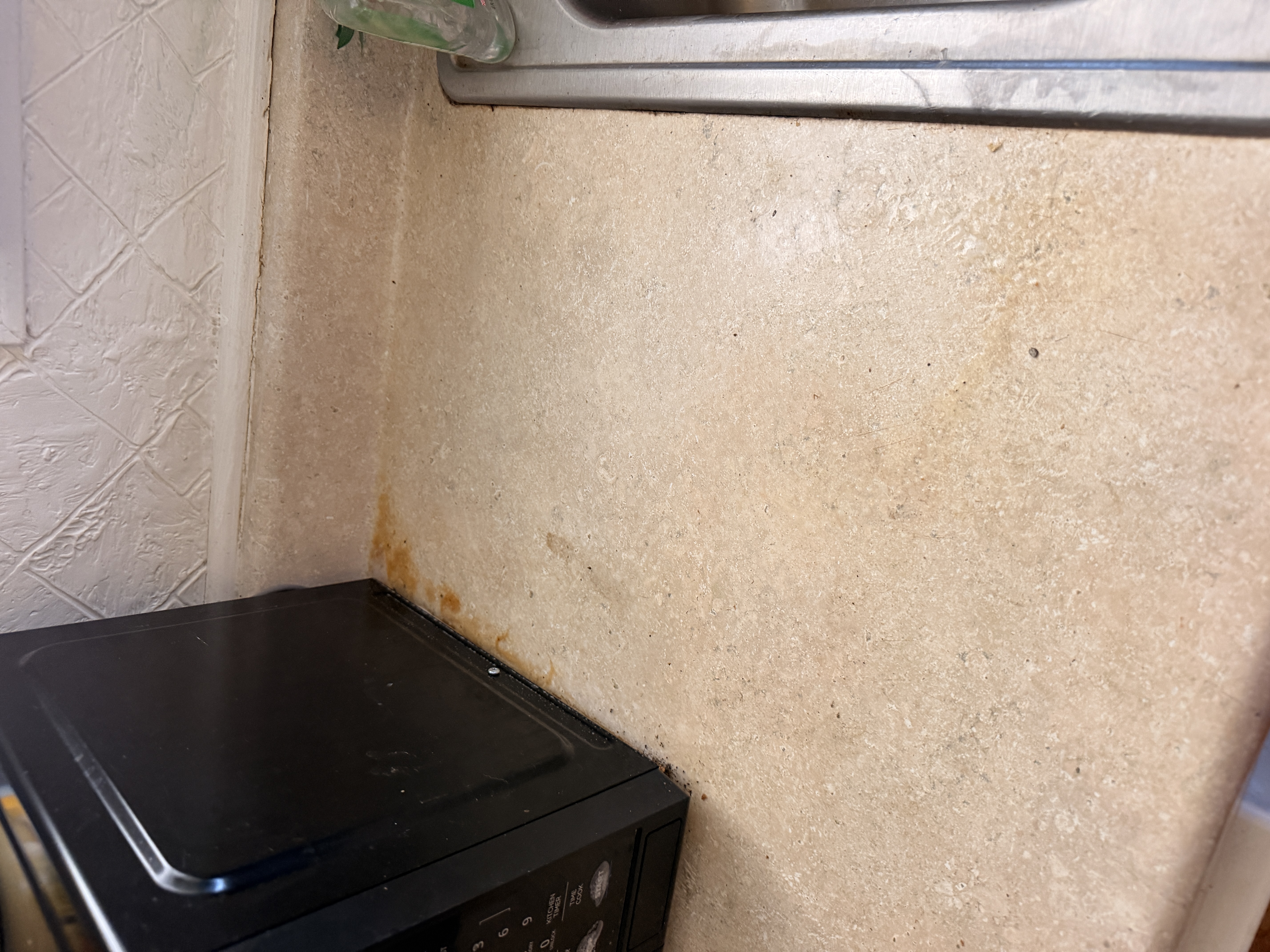 Kitchen countertop before cleaning